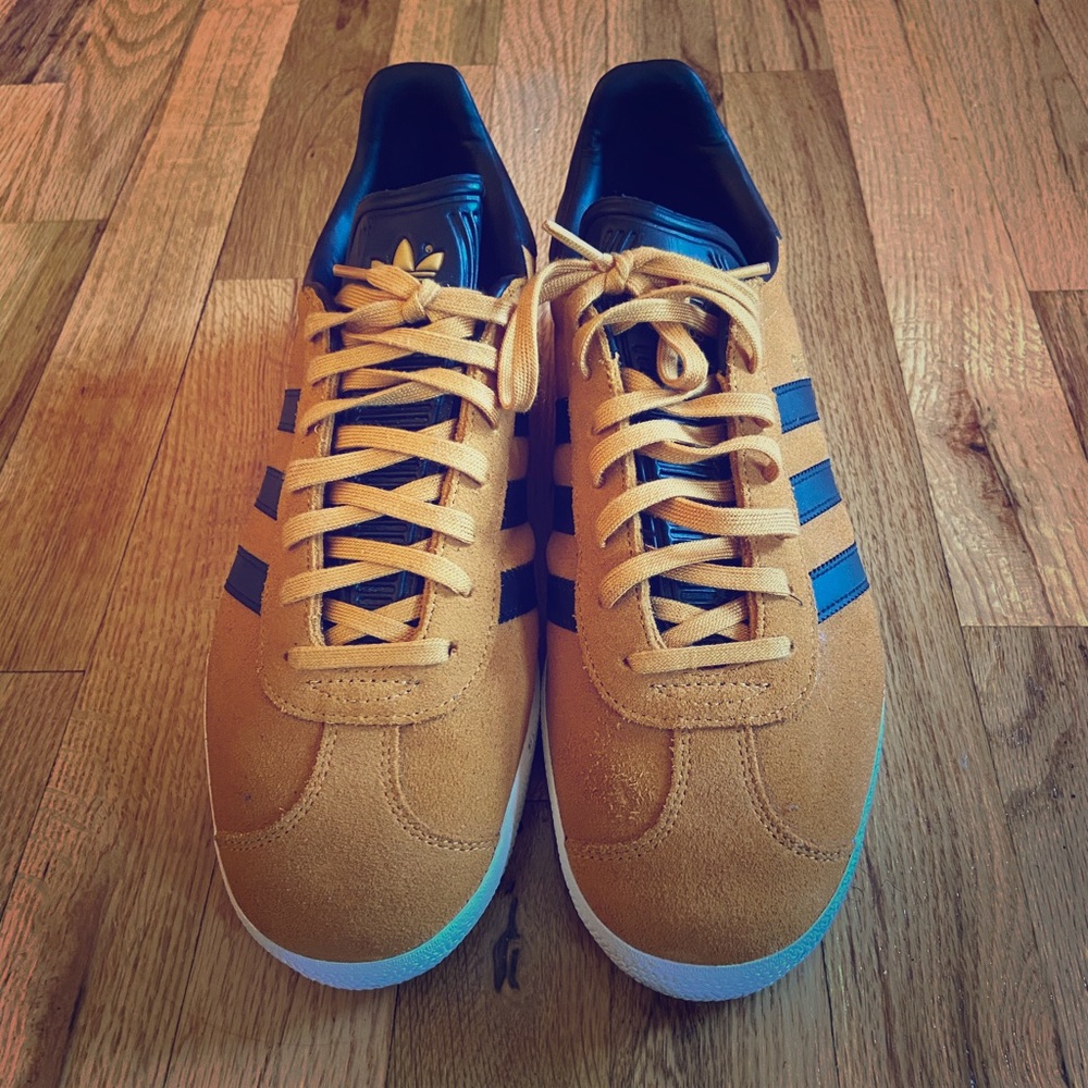 Orange and Black suede Gazelle Adidas.